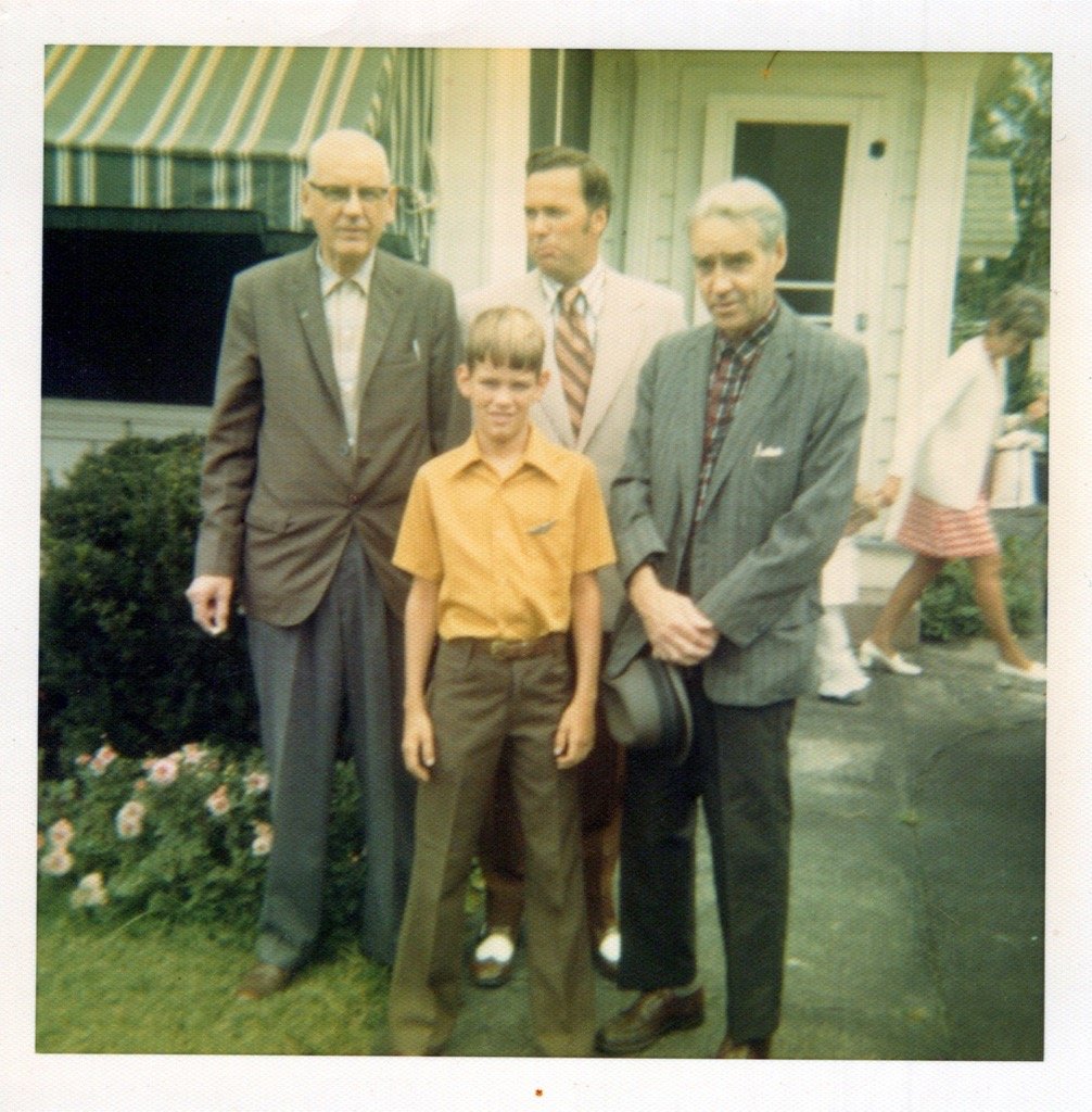 Jim, unknown, Howard, unknown, Clarke home on Geddes St.