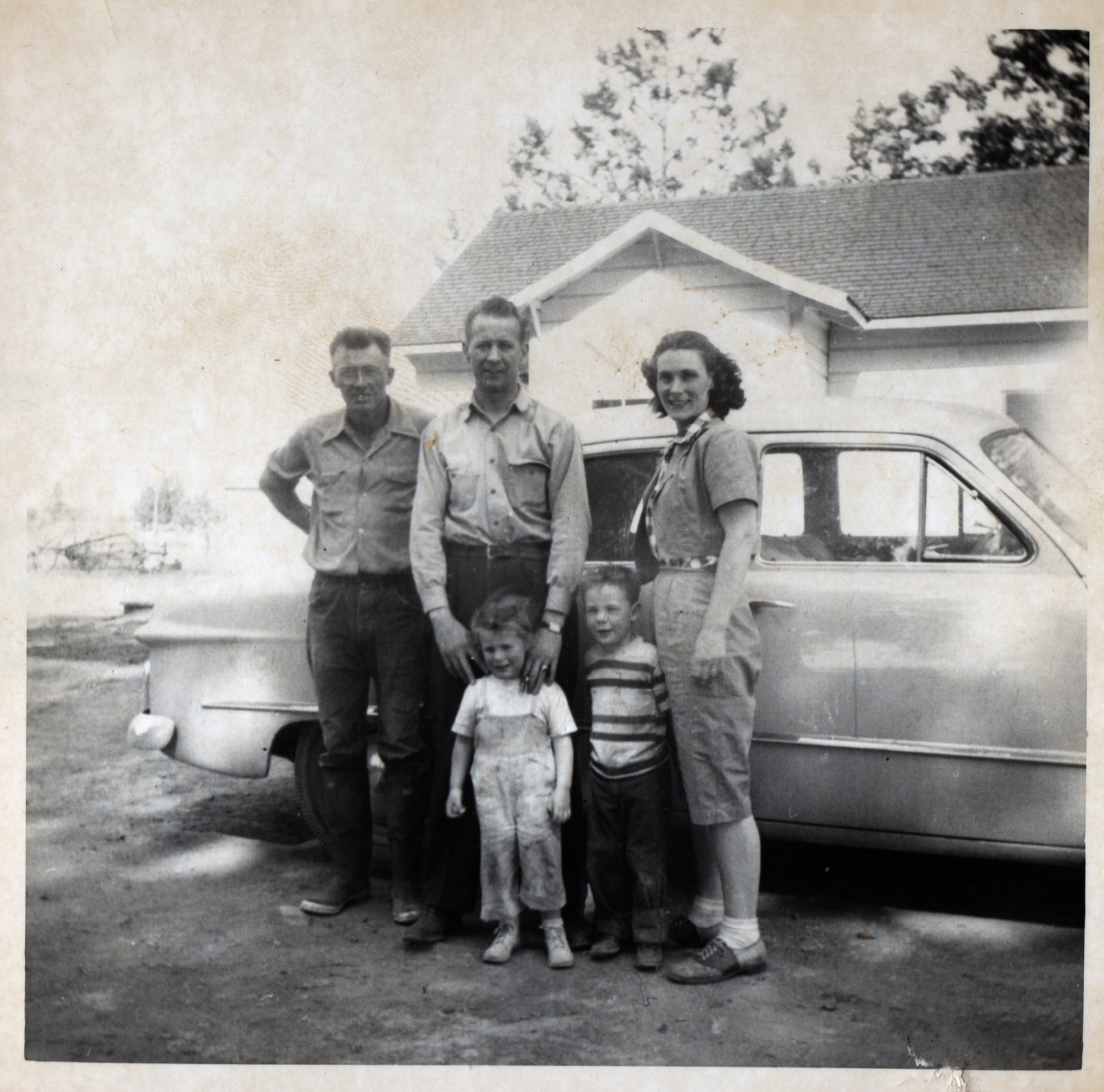 Mary Alice and Jim with Children and John Manning.