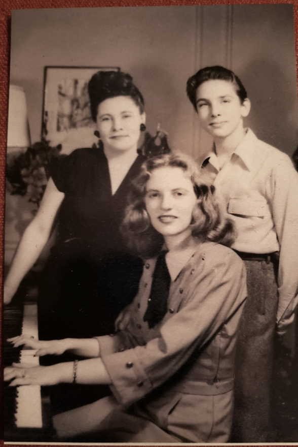 Photograph and sleeve/cover of from left to right of Ted, Stella, and Helen celebrating Helen’s sixteenth birthday at the 400 restaurant, February 1946.