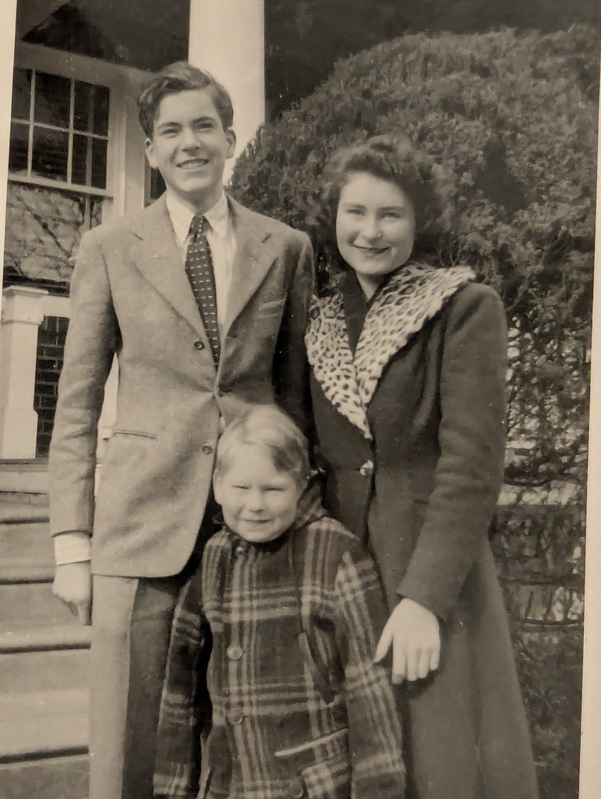 Dolores and Brothers in Front of House.